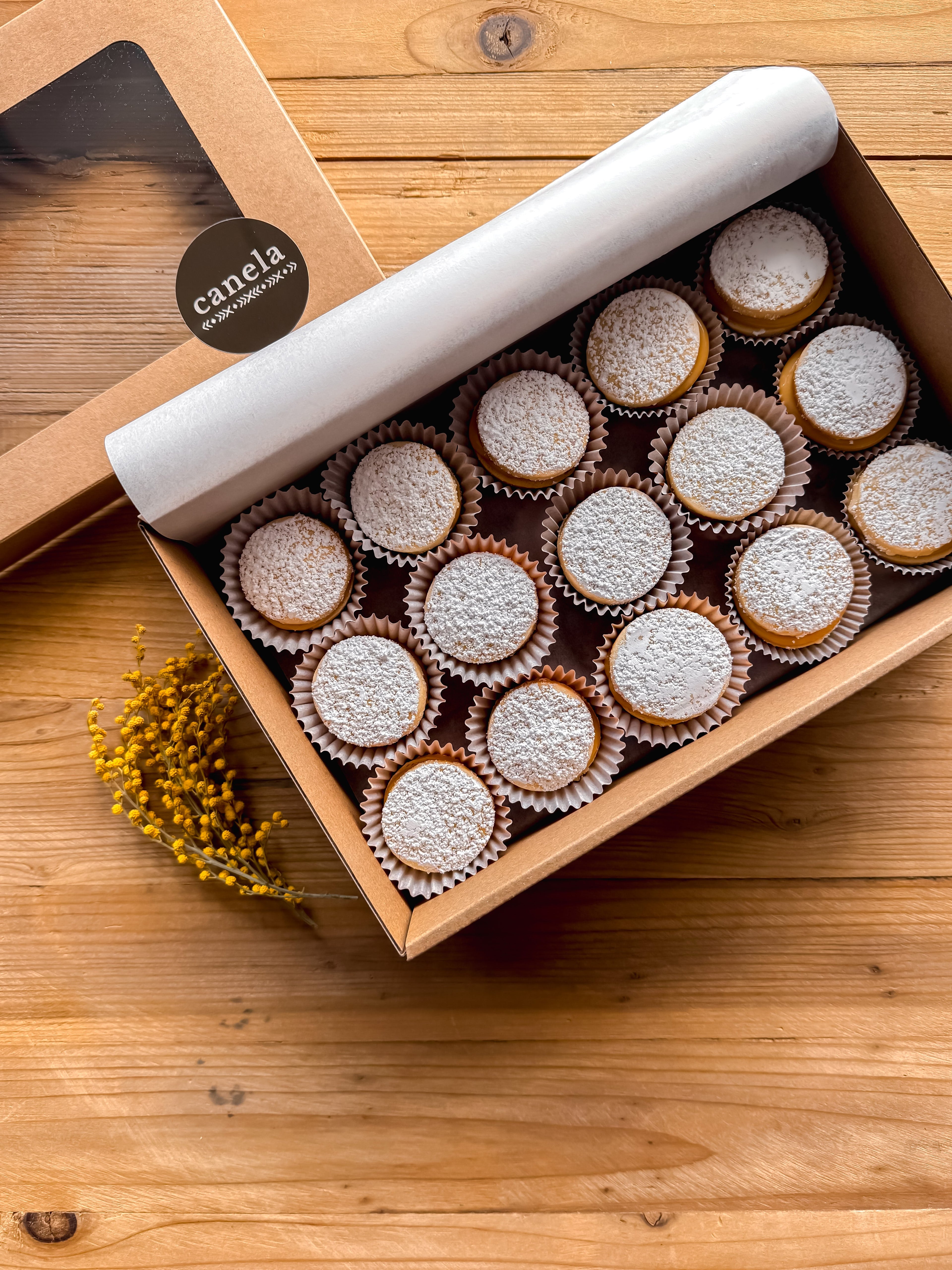 canela best selling desserts with mini alfajores and dulce de leche boxes